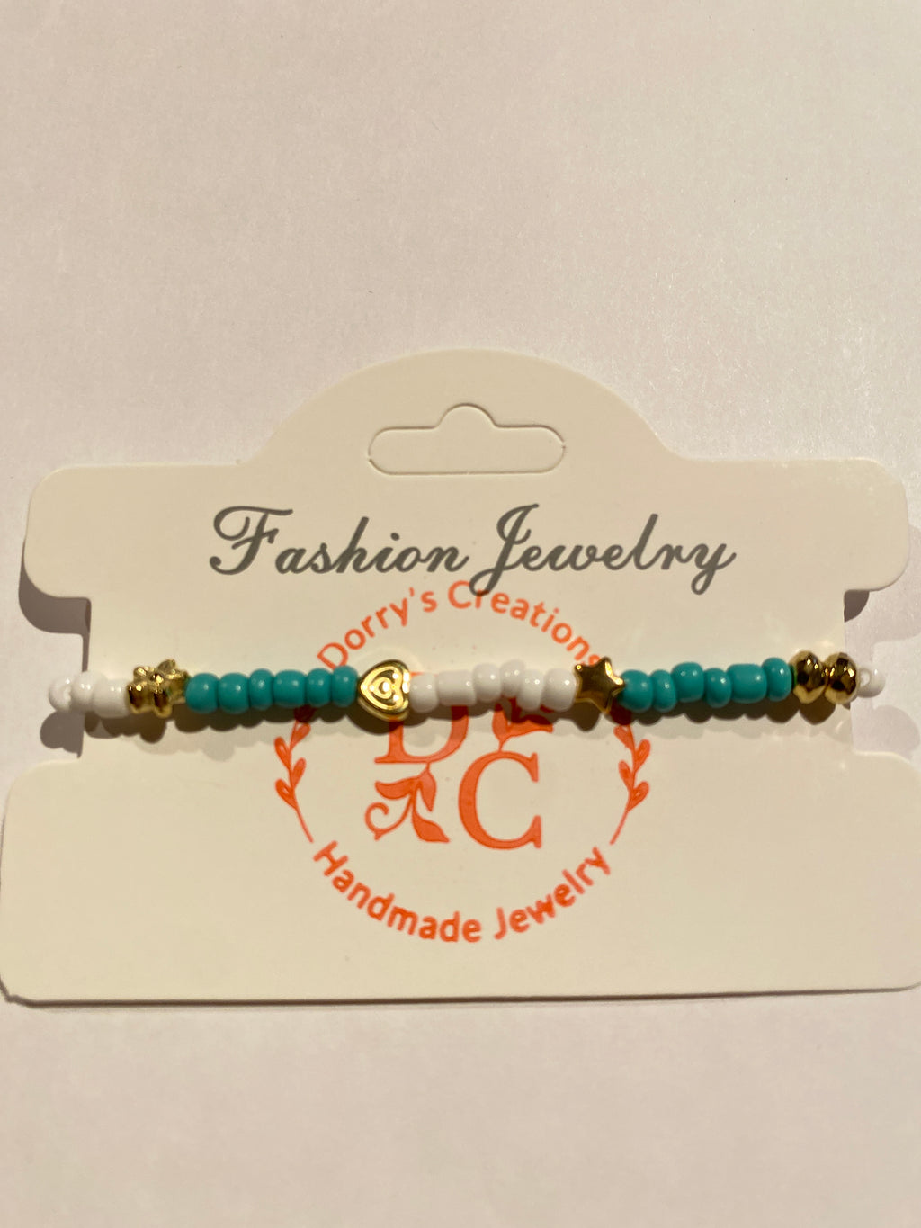 Stretch Bead Bracelet Blue, White and Gold can be worn alone or together with others