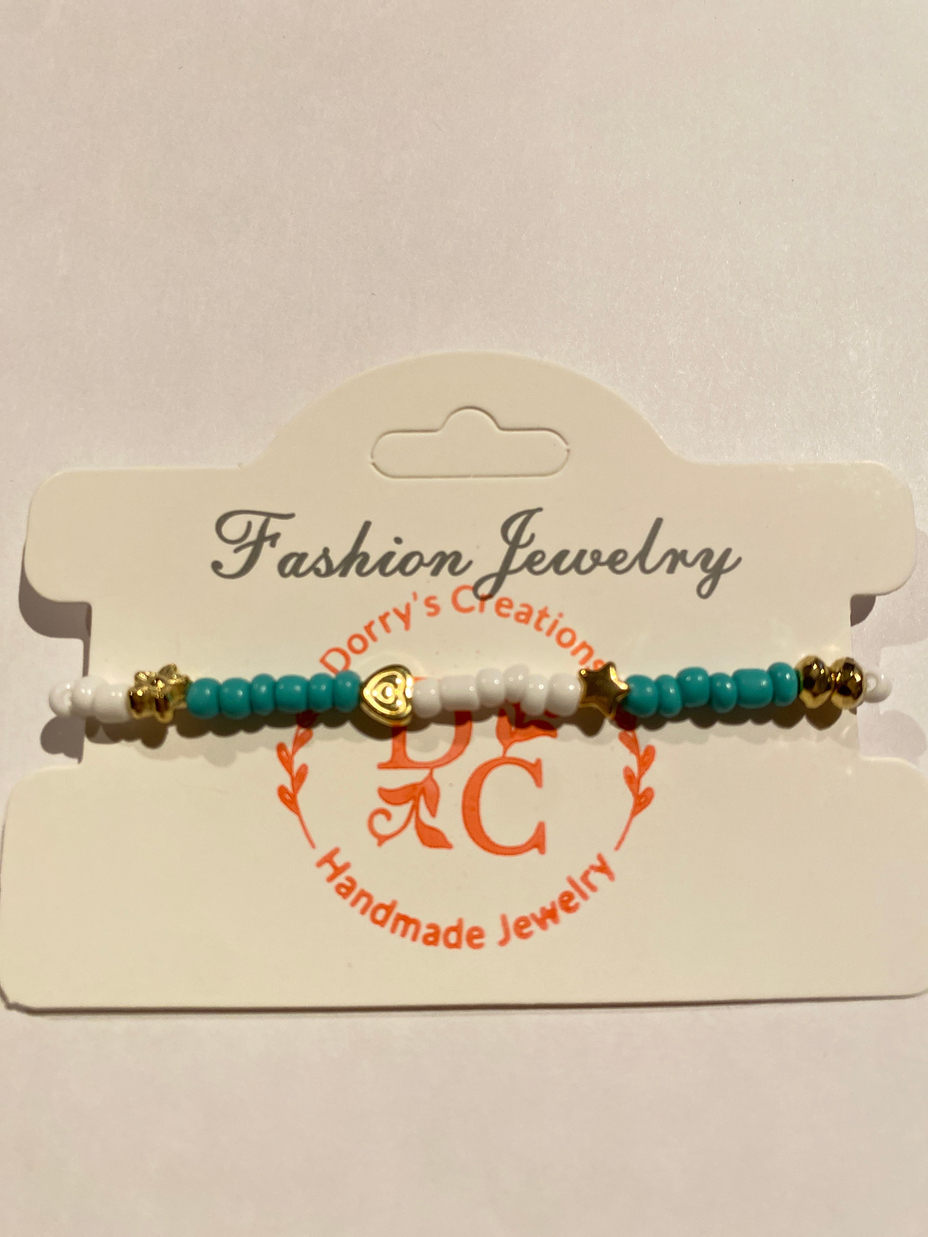 Stretch Bead Bracelet Blue, White and Gold can be worn alone or together with others