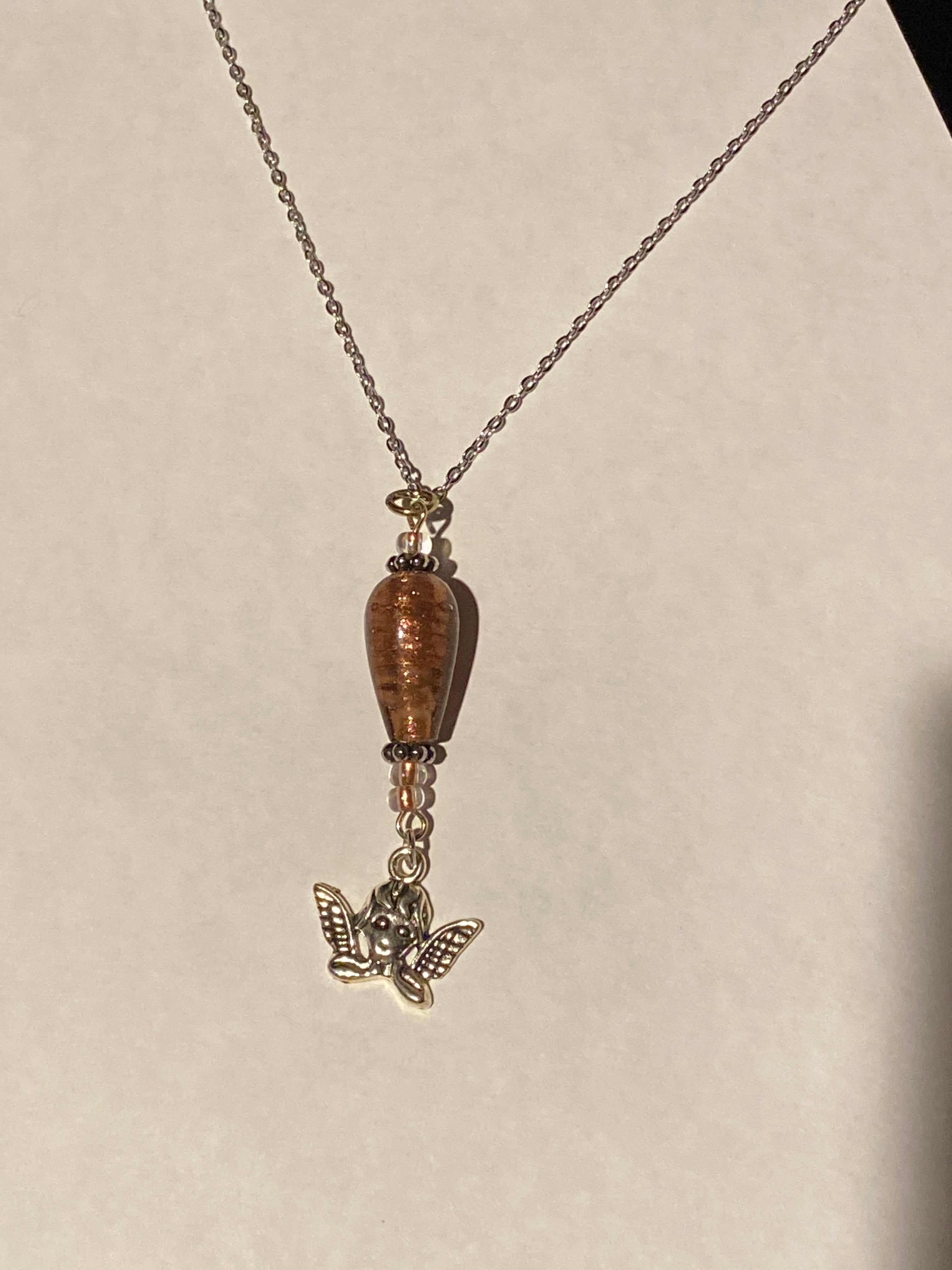 Angel pendant with Glass bead accent Silver tone necklace