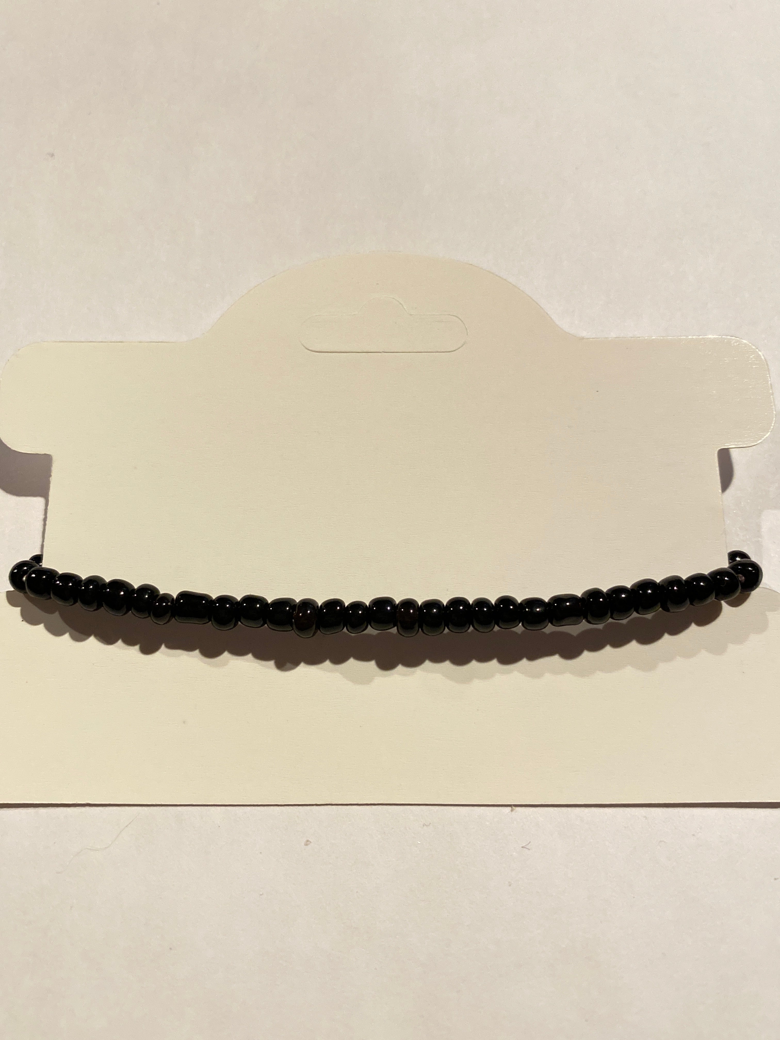 Stretch Bead Bracelet Black and Gold can be worn alone or together with others