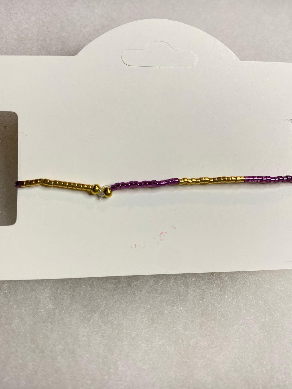 Dainty Purple and Gold Bead Bracelet with gold bead accent