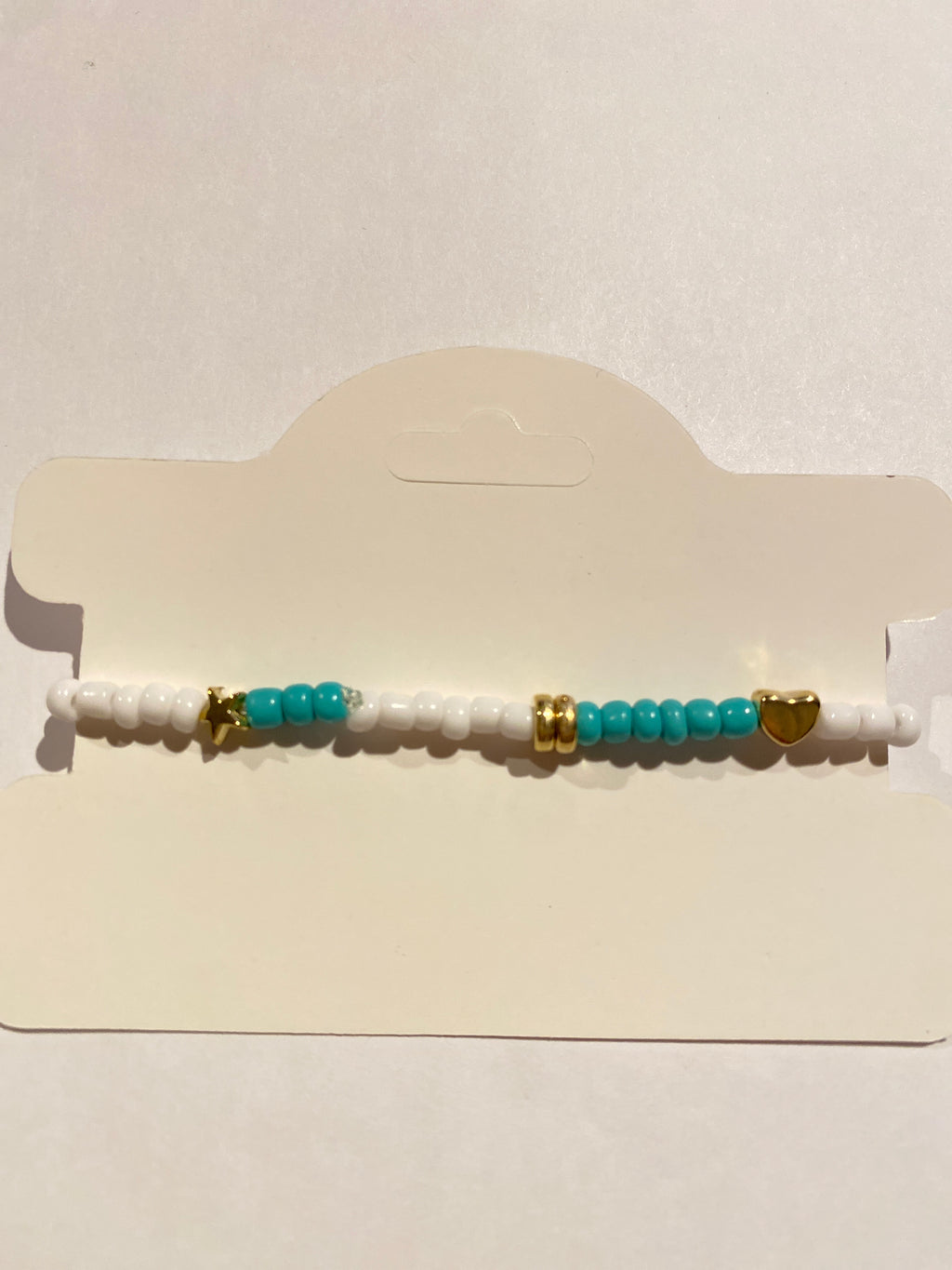 Stretch Bead Bracelet Blue, White and Gold can be worn alone or together with others