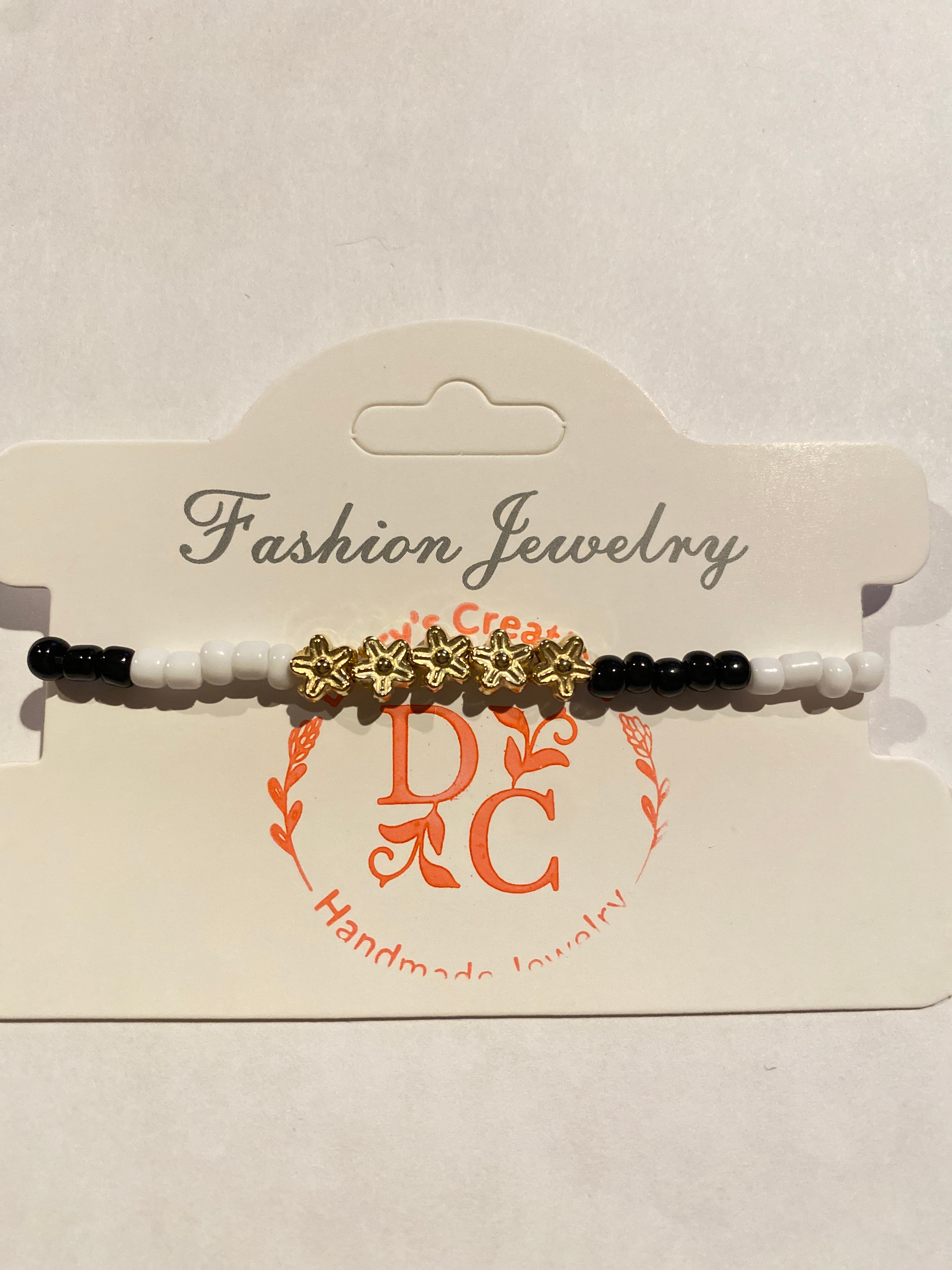Stretch Bead Bracelet Black, White and Gold can be worn alone or together with others