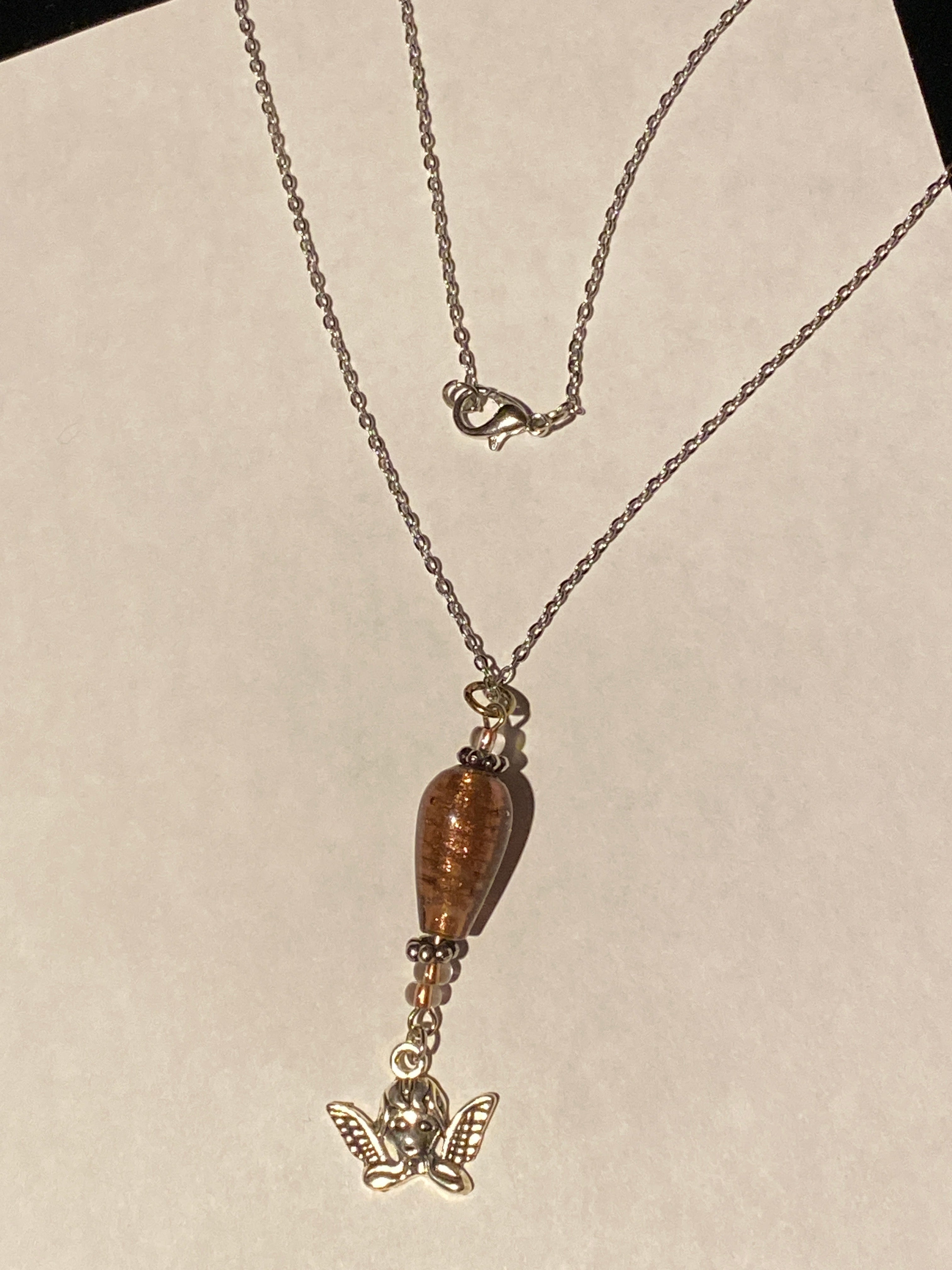 Angel pendant with Glass bead accent Silver tone necklace