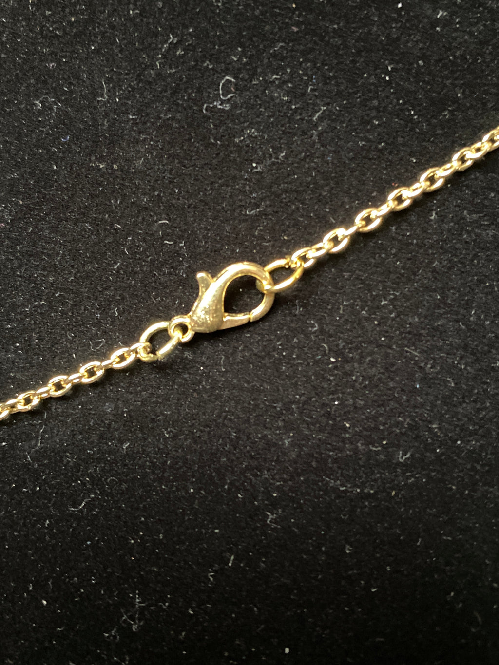 Purple and smoky Rhinestone pendant gold tone necklace