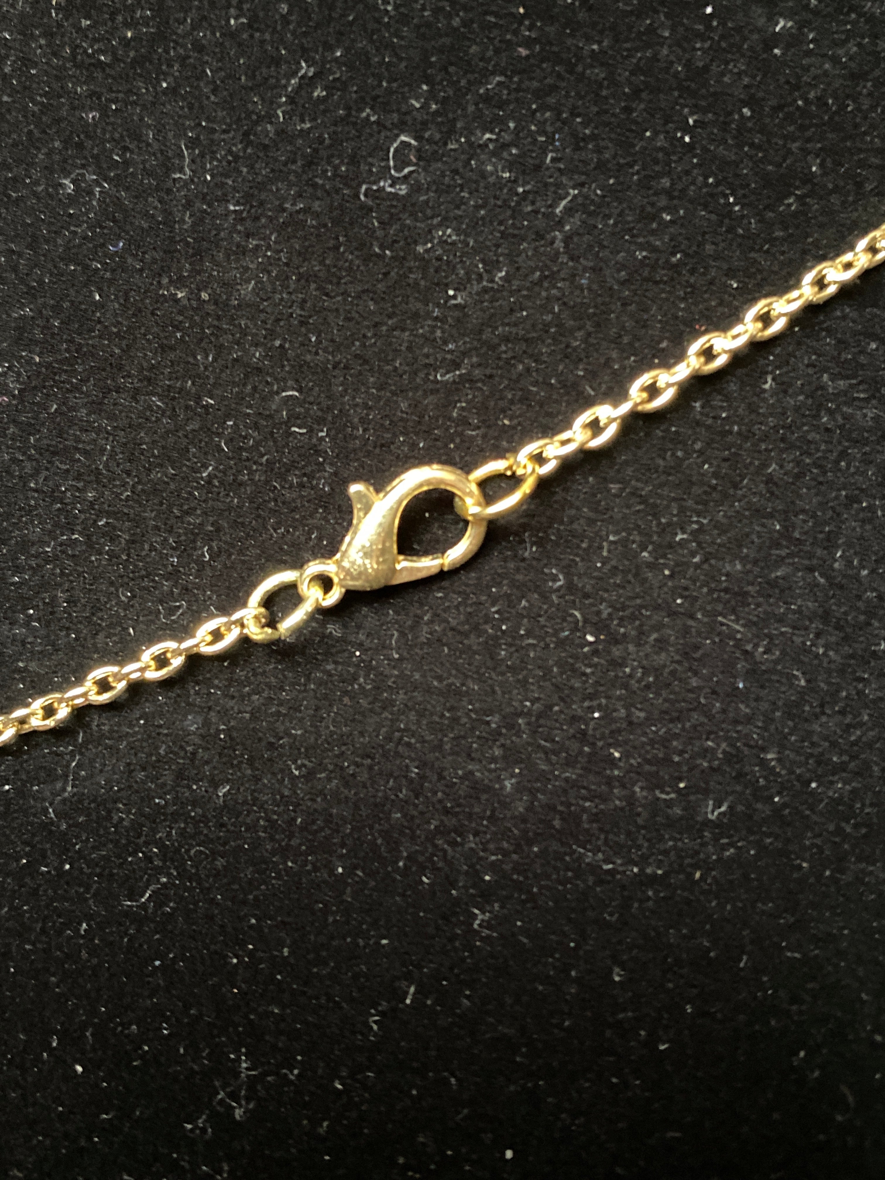 Purple and smoky Rhinestone pendant gold tone necklace