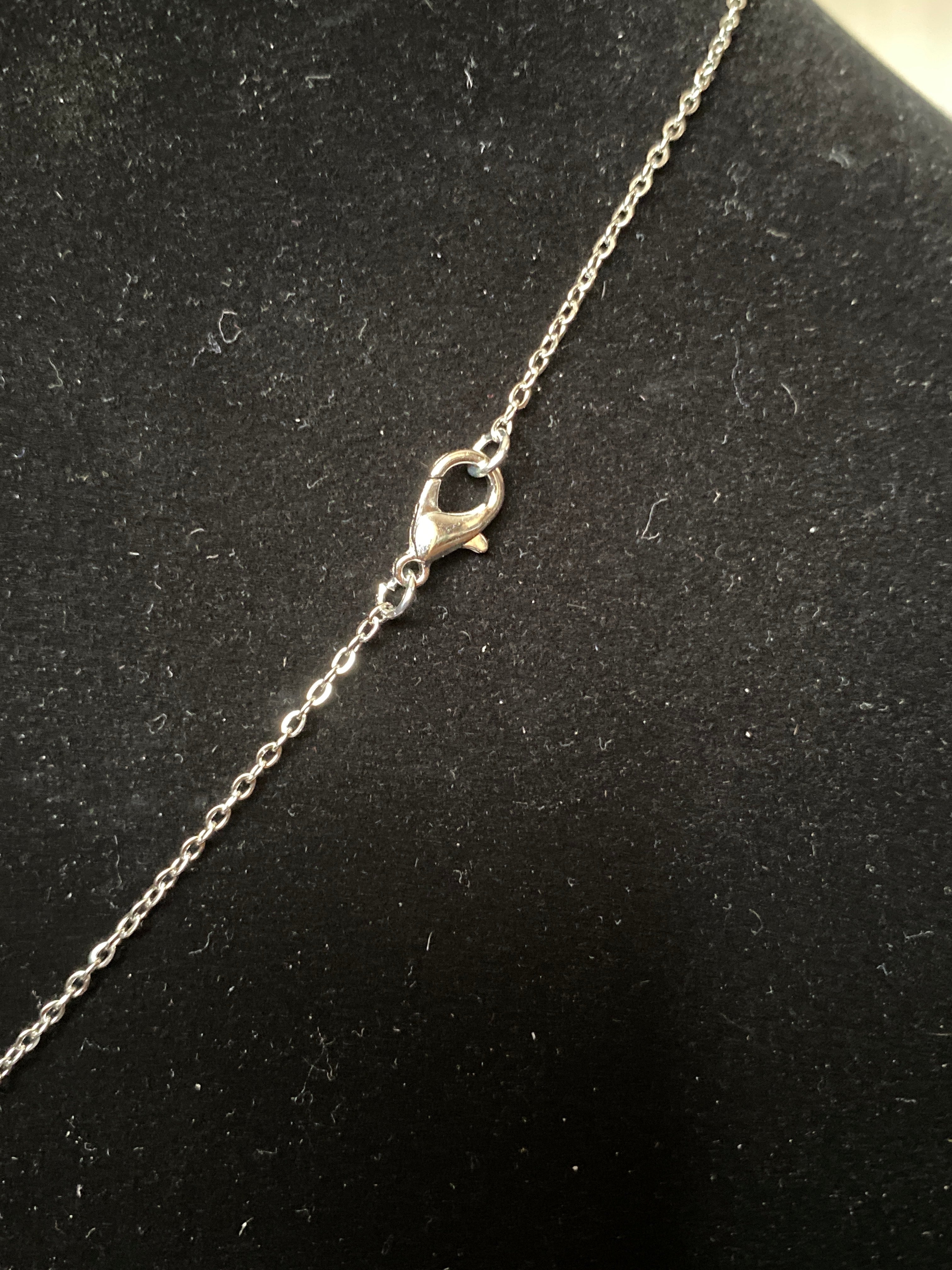 Rhinestone pendant silver tone necklace