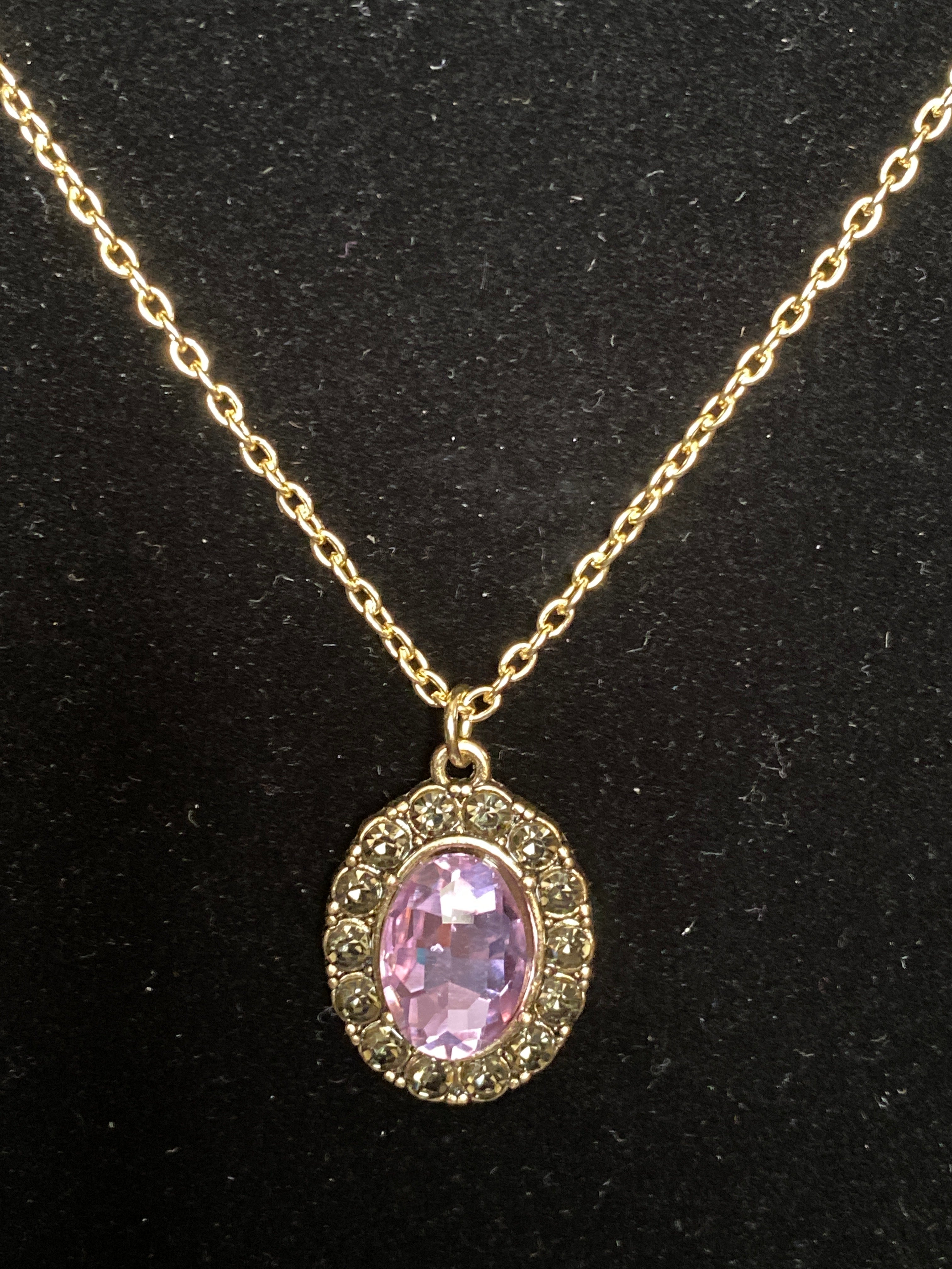 Purple and smoky Rhinestone pendant gold tone necklace