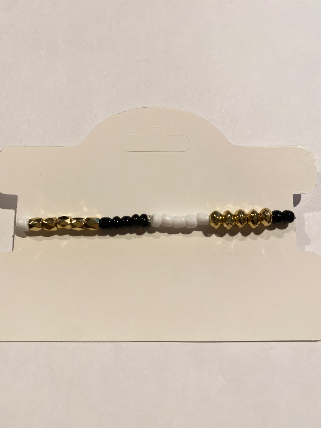 Stretch Bead Bracelet Black, White and Gold can be worn alone or together with others