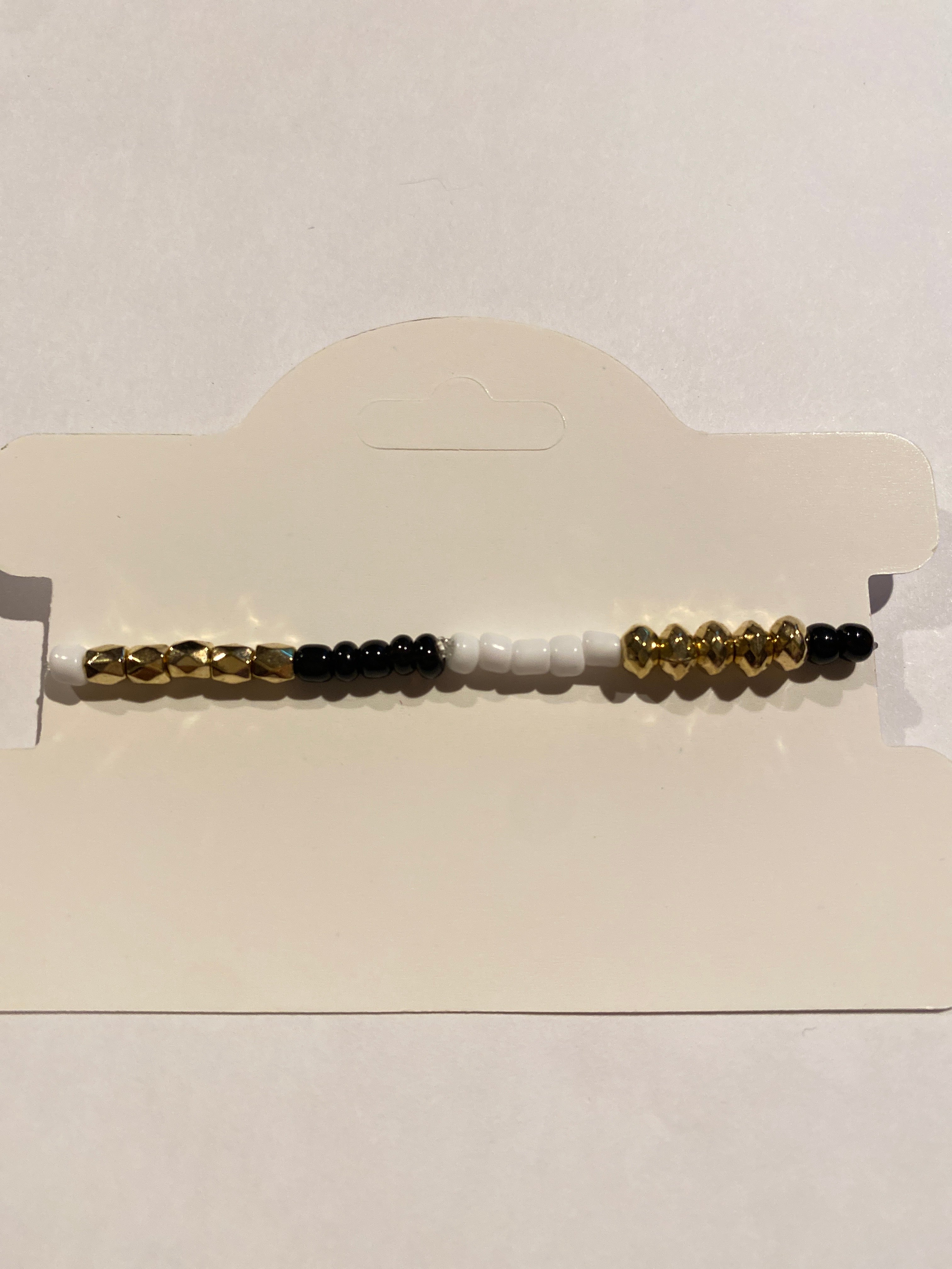 Stretch Bead Bracelet Black, White and Gold can be worn alone or together with others