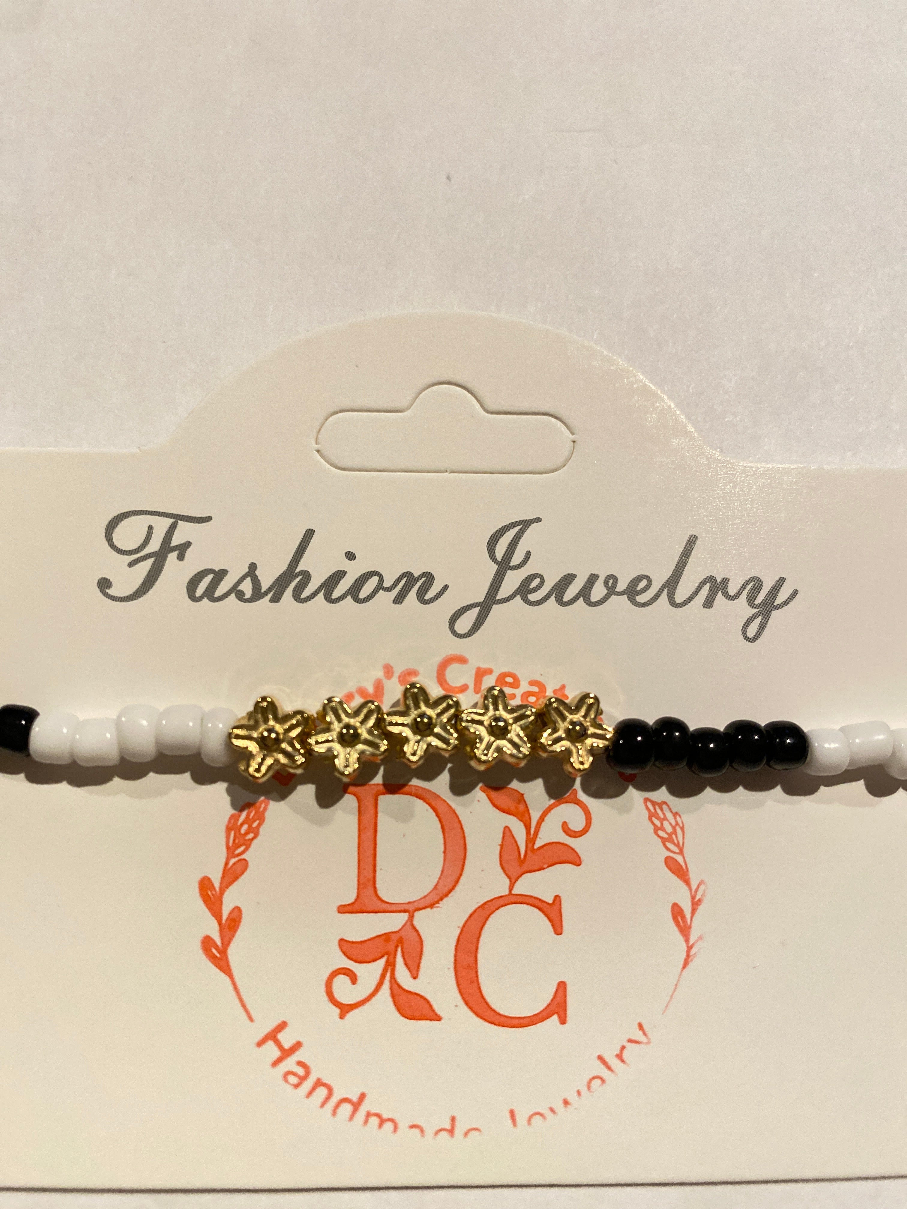 Stretch Bead Bracelet Black, White and Gold can be worn alone or together with others