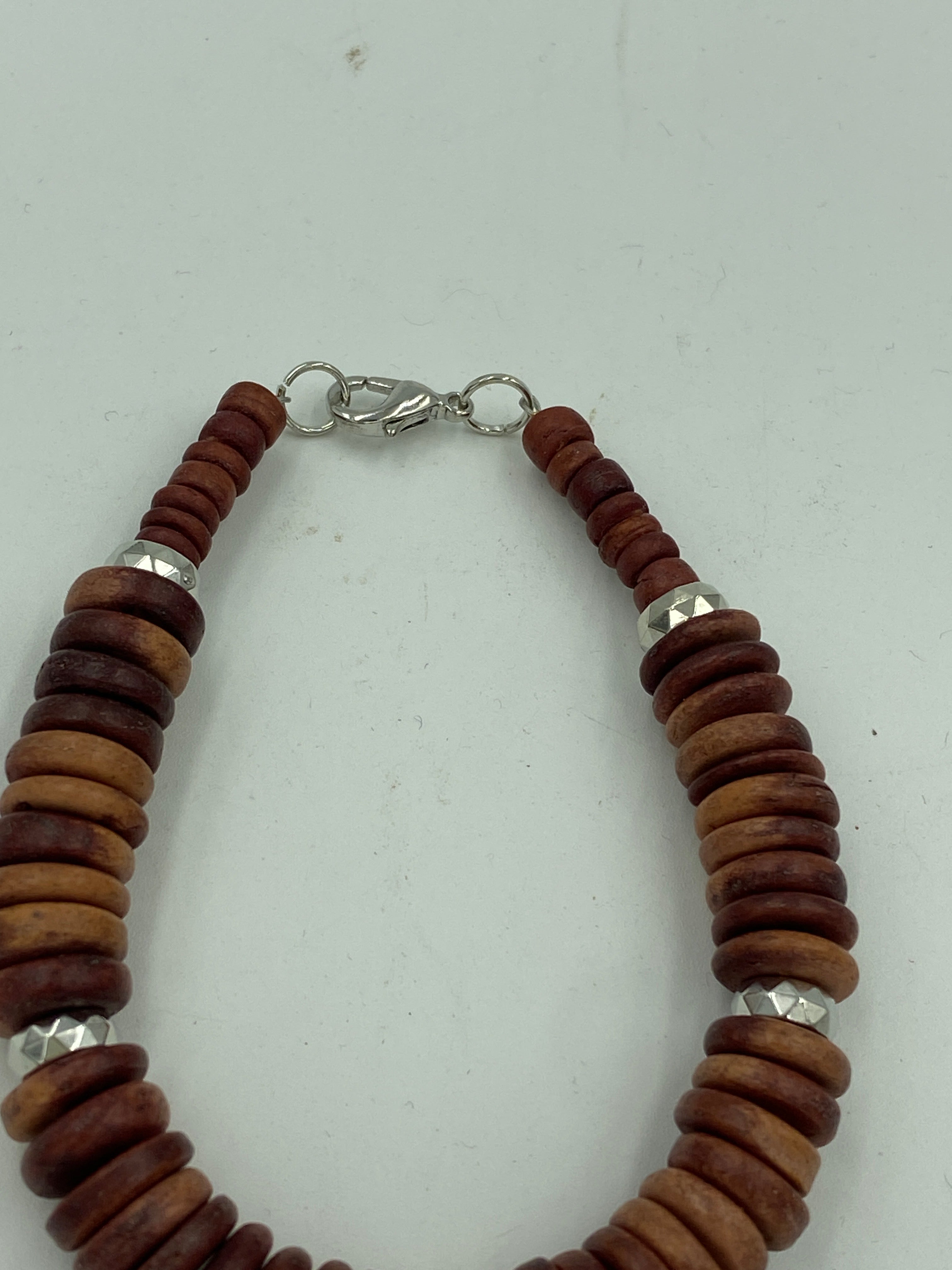 Wood Bead Bracelet with silver bead accent